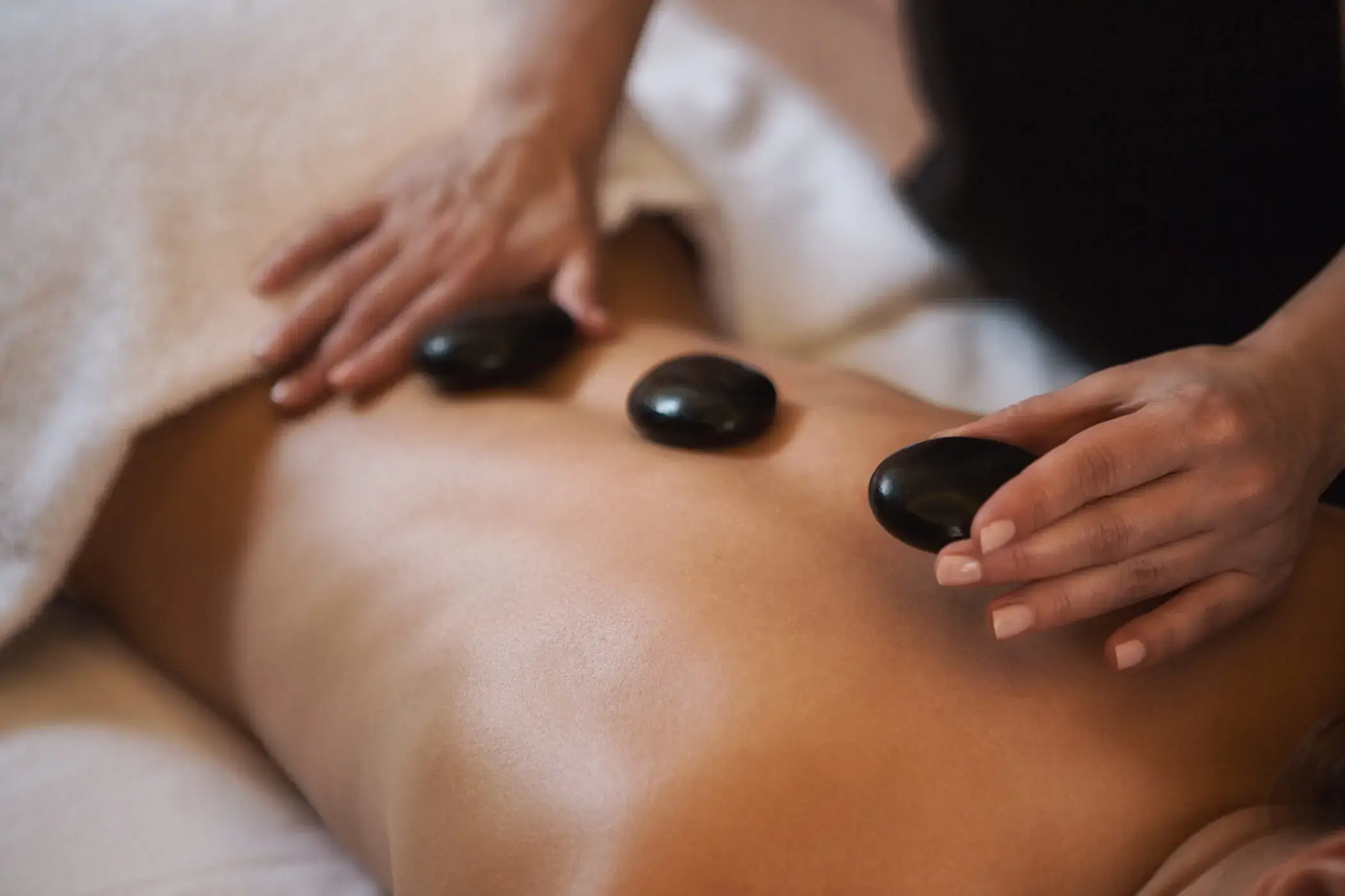 Hot stone massage in AlBarsha  